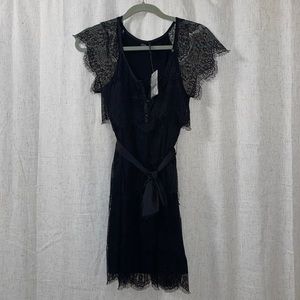 Guess black lace dress. Medium. Never worn.